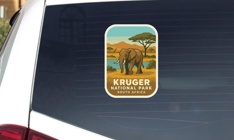 a sticker on the rear window of a car that displays an illustration of an elephant in Kruger National Park, South Africa.