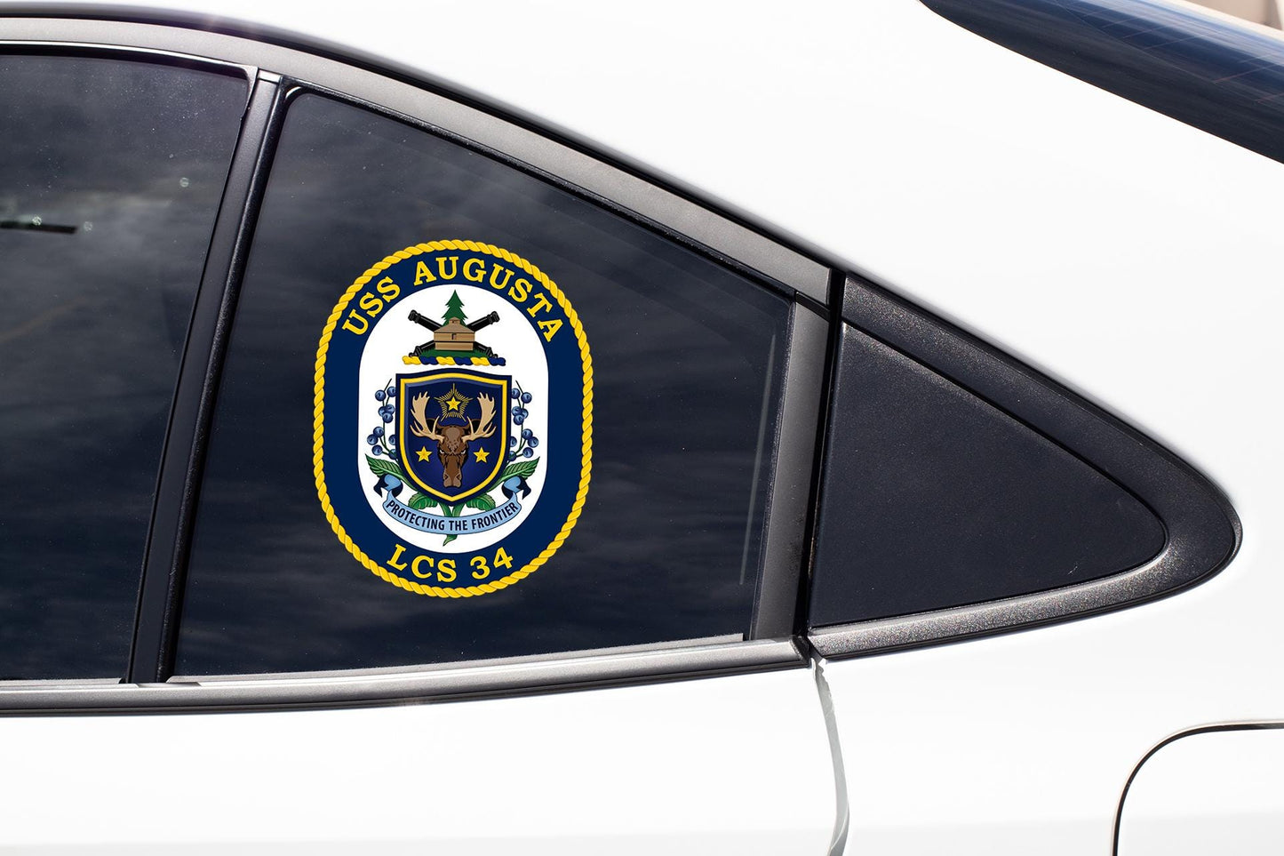 a close up of a car window with a badge on it