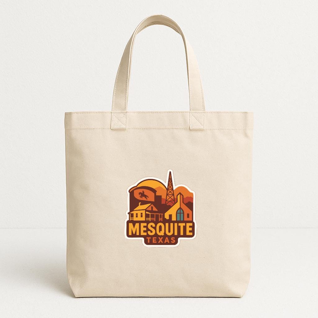 A beige canvas tote bag with a graphic design featuring a stylized illustration of a town or city, along with the text "Mesquite, Texas" printed on it.