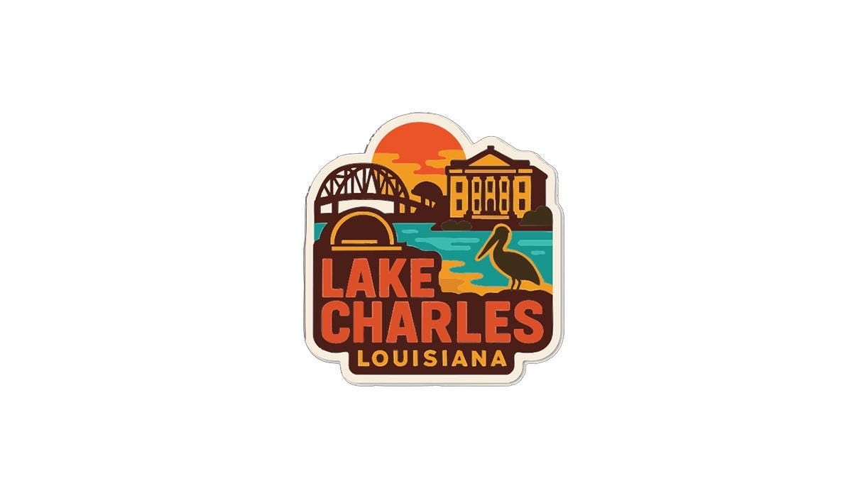 A sticker or logo featuring a bird, a bridge, and a sunset over a body of water, with the text "LAKE CHARLES LOUISIANA" prominently displayed.