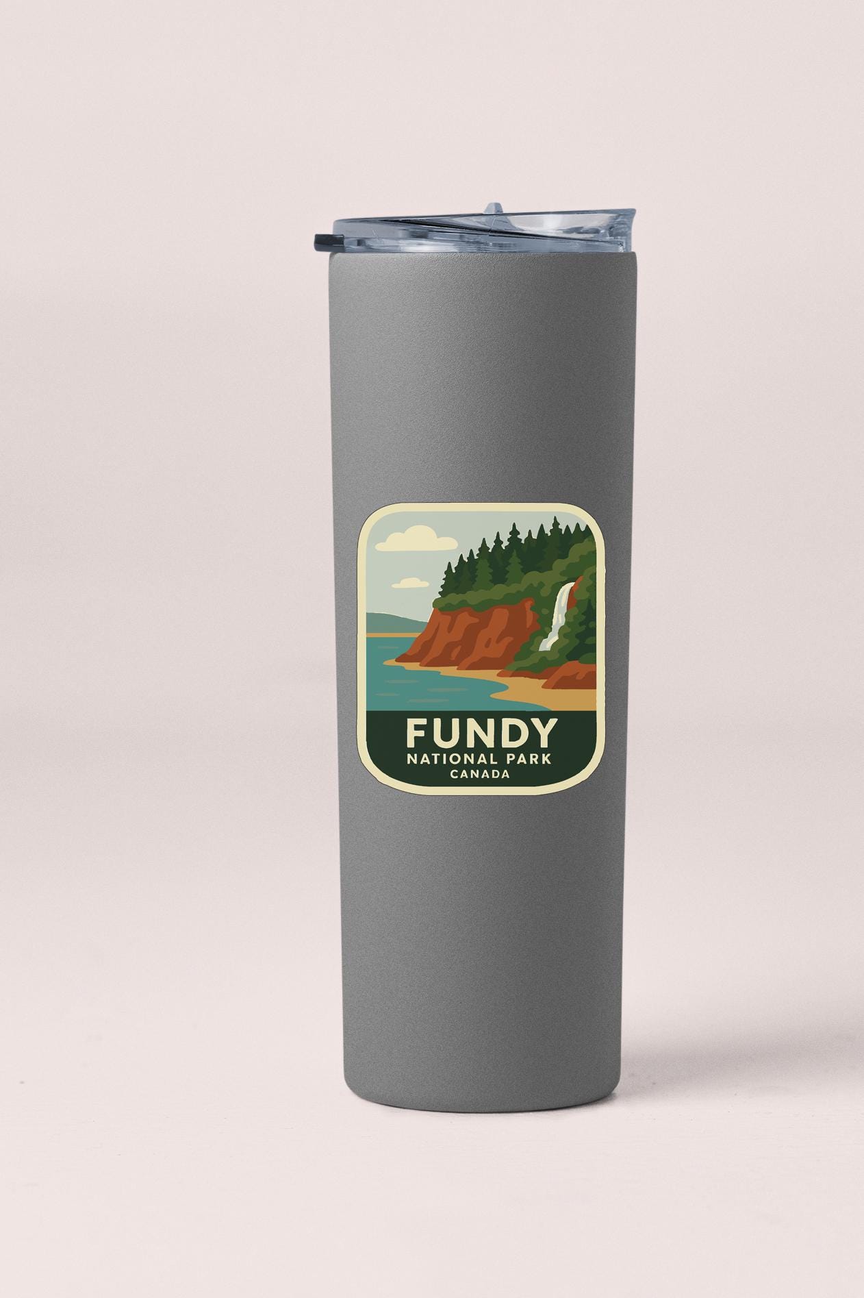 A gray insulated tumbler with a label that says "FUNDY NATIONAL PARK CANADA".