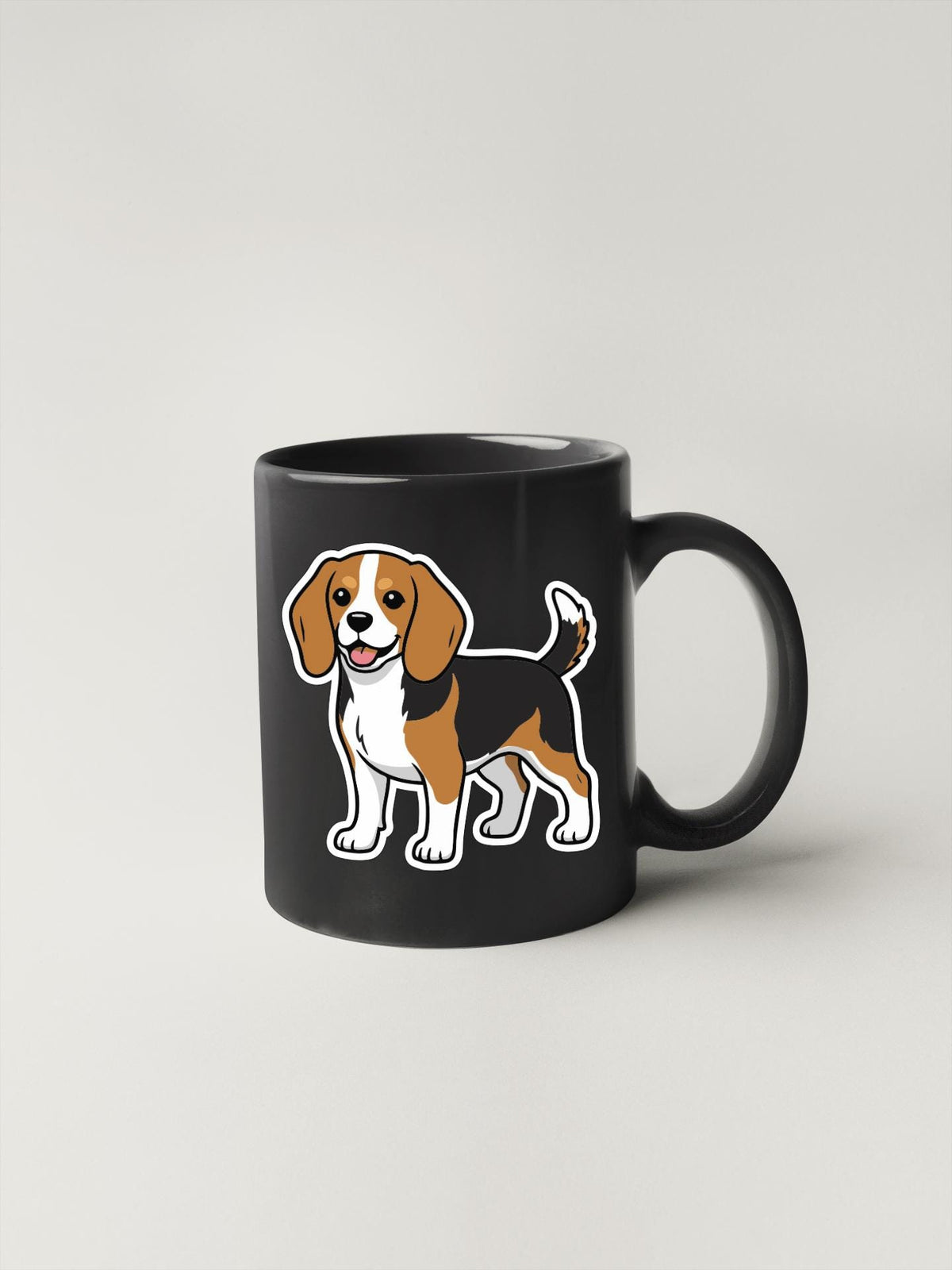 A black coffee mug with a cartoon illustration of a beagle dog on it.