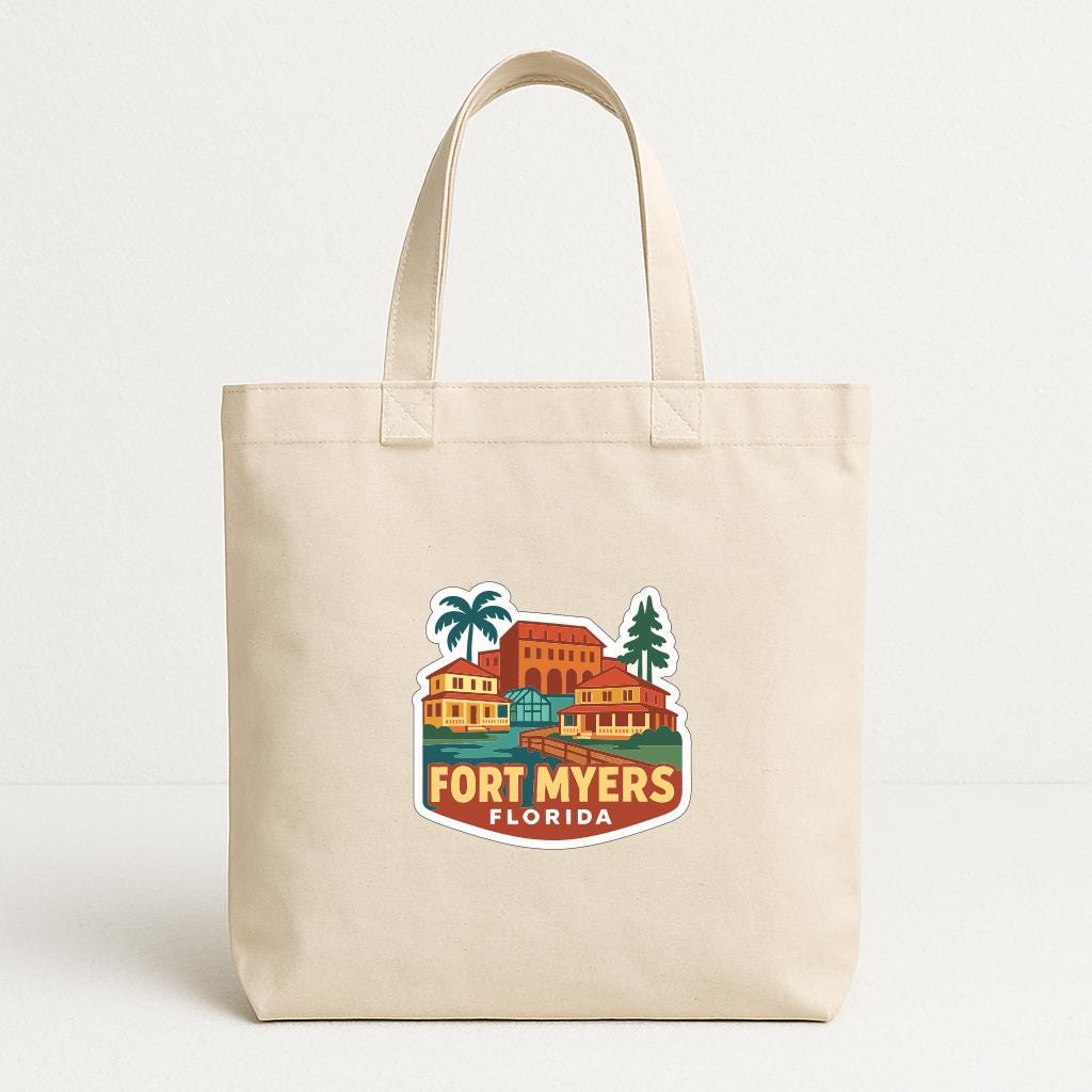 A beige tote bag with a printed design depicting a tropical resort or hotel with palm trees and other buildings, along with the text "FORT MYERS FLORIDA".