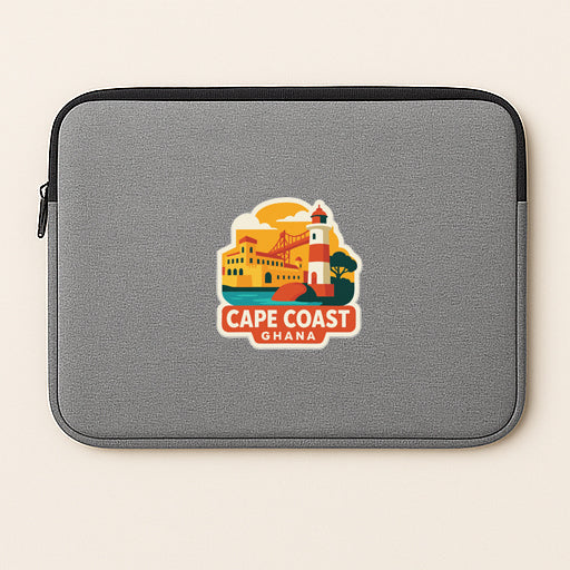 a gray laptop sleeve with a graphic of a lighthouse and a building, along with the text "Cape Coast Ghana".
