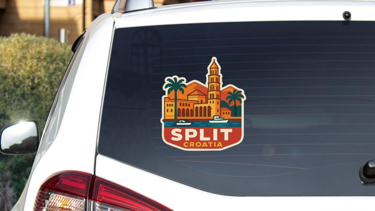 a sticker on the rear window of a car that displays a cityscape with a tall building and palm trees, along with the text "SPLIT CROATIA".
