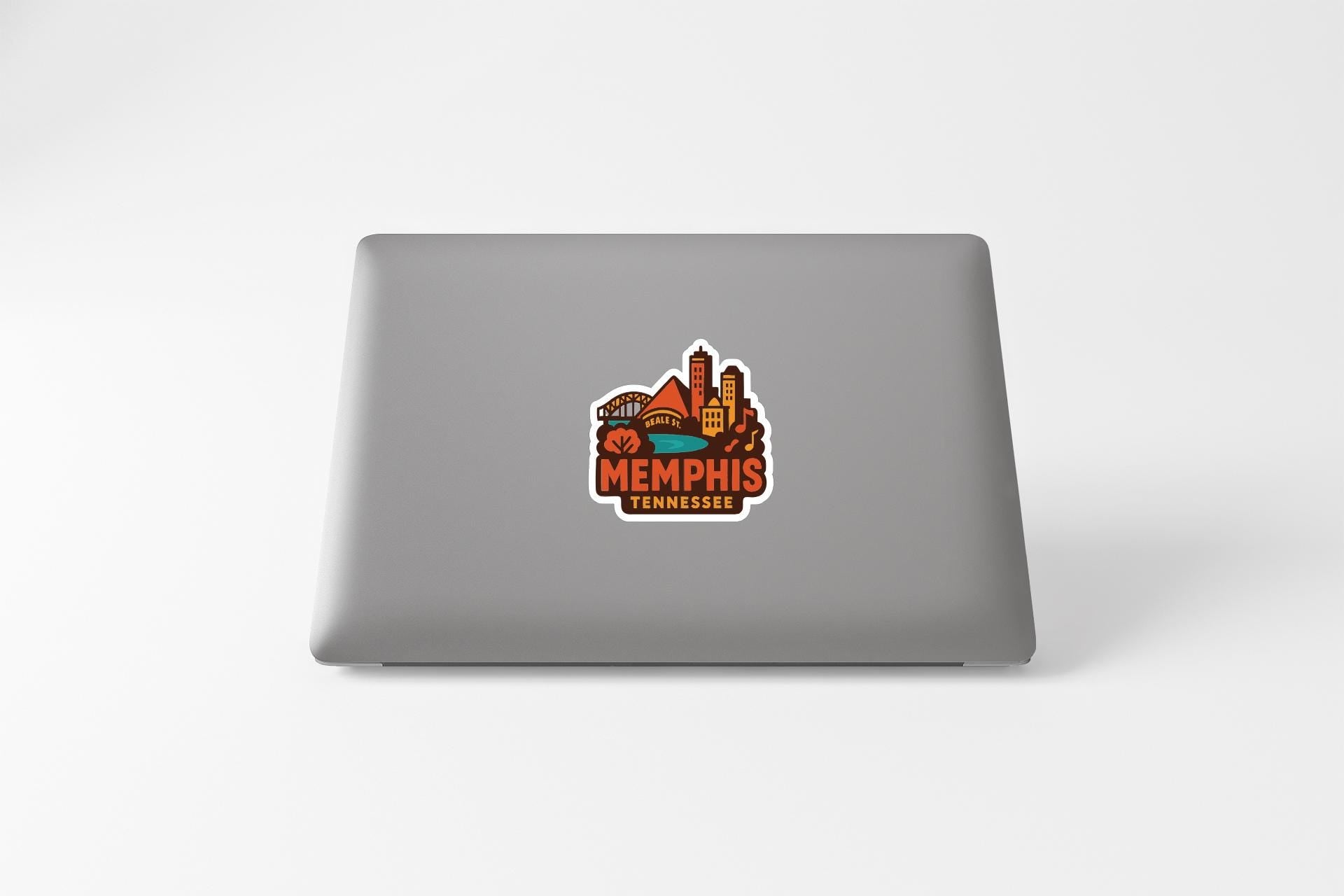a sticker with the text "Memphis, Tennessee" and an illustration of the city skyline.