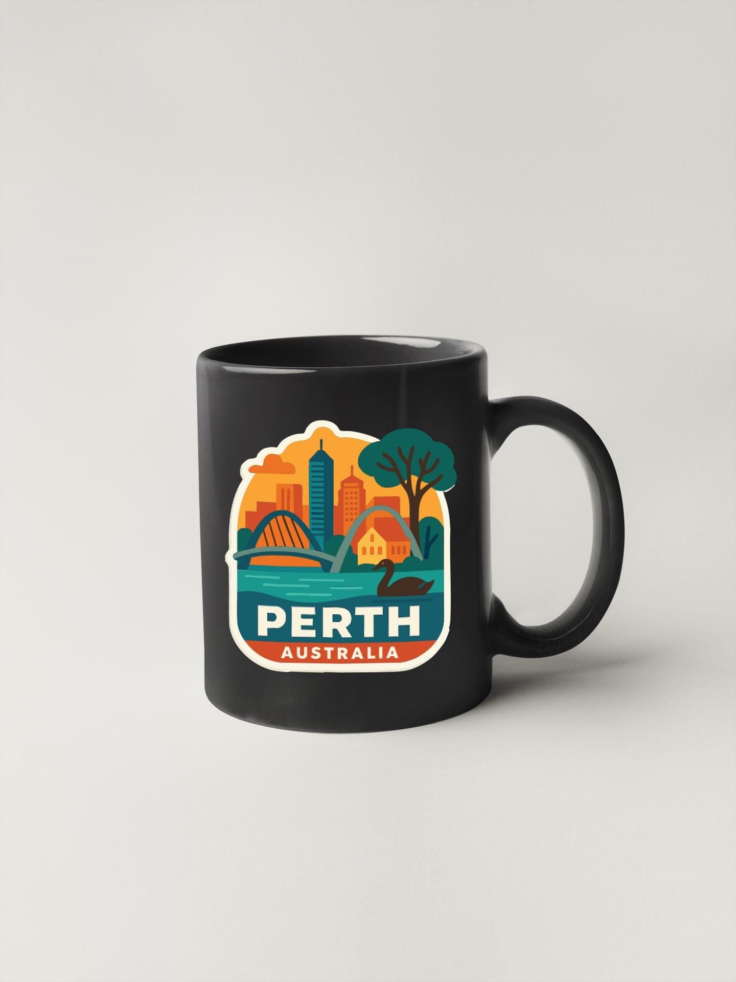 A black coffee mug with a colorful graphic depicting the city of Perth, Australia.