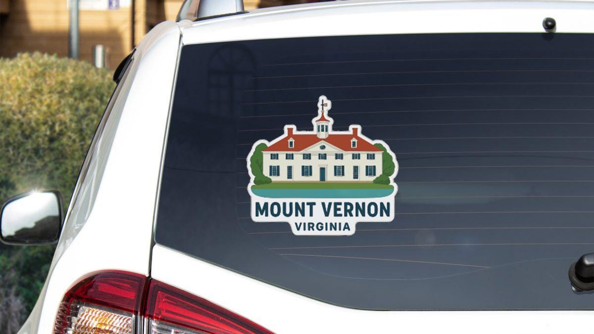 a sticker on the rear window of a white car, depicting a building with a red roof and a steeple, representing Mount Vernon, Virginia.