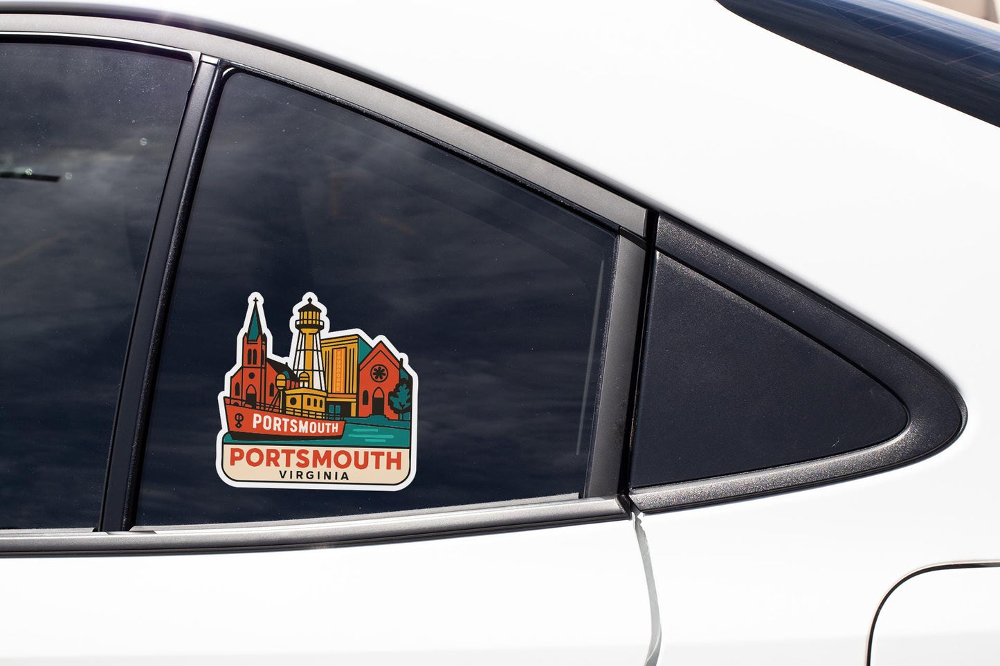 A sticker on the side of a car window, depicting a cityscape with a church and other buildings.