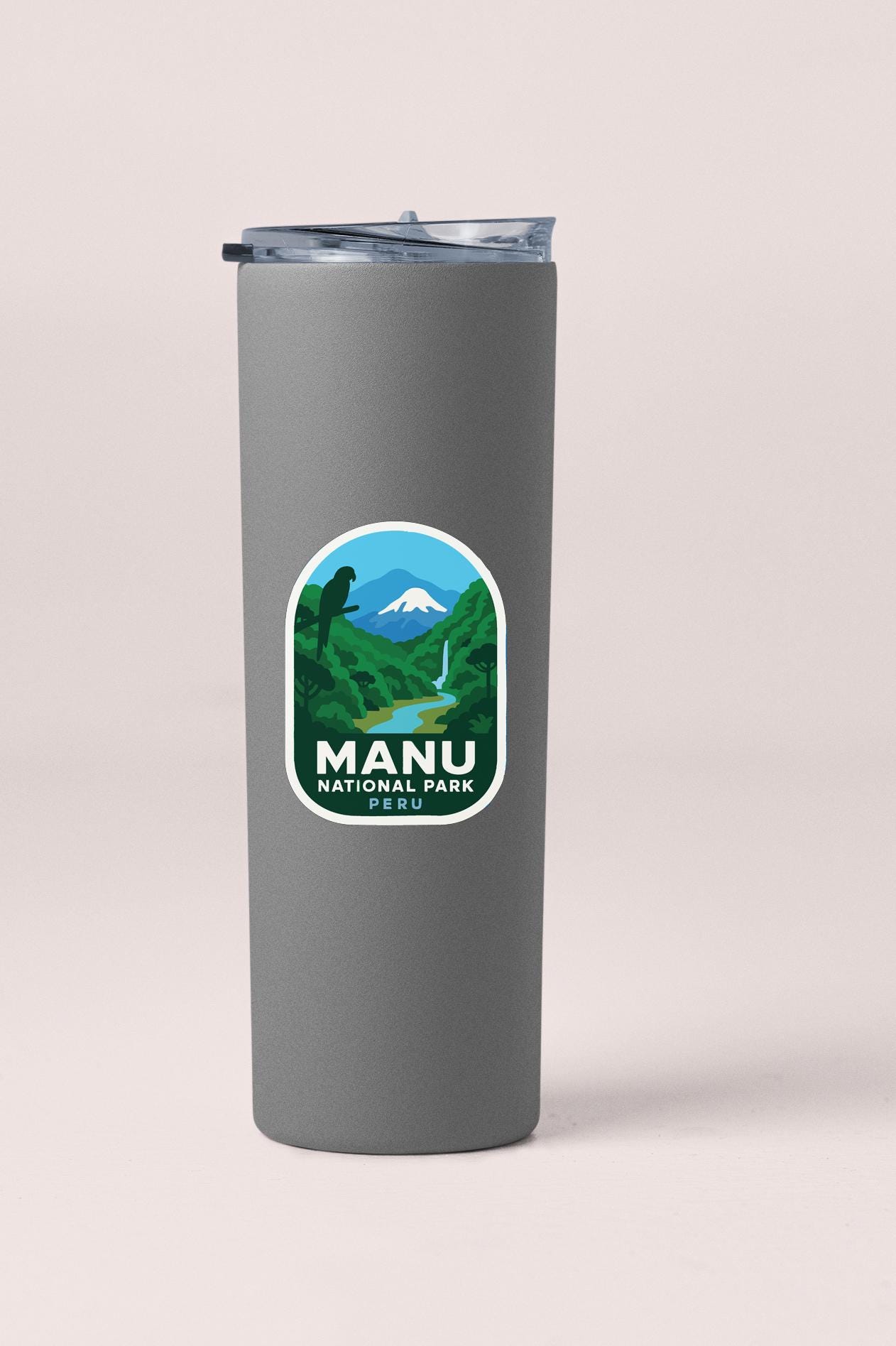 A gray tumbler with a label that says "MANU NATIONAL PARK PERU".