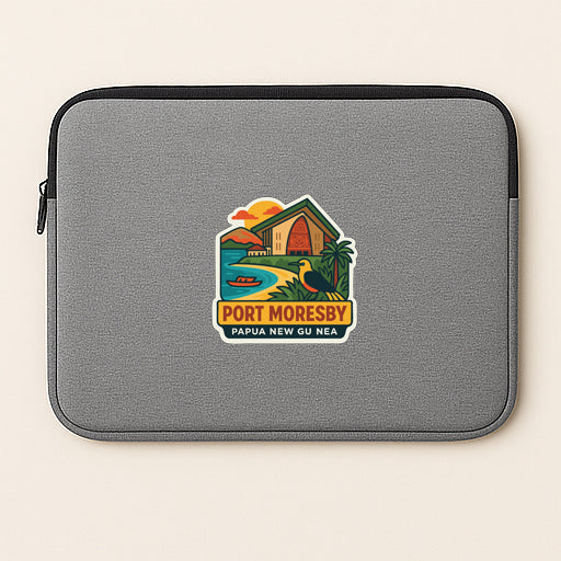 A gray laptop sleeve with a colorful sticker depicting a tropical beach scene and the text "PORT MORESBY PAPUA NEW GU NEA".