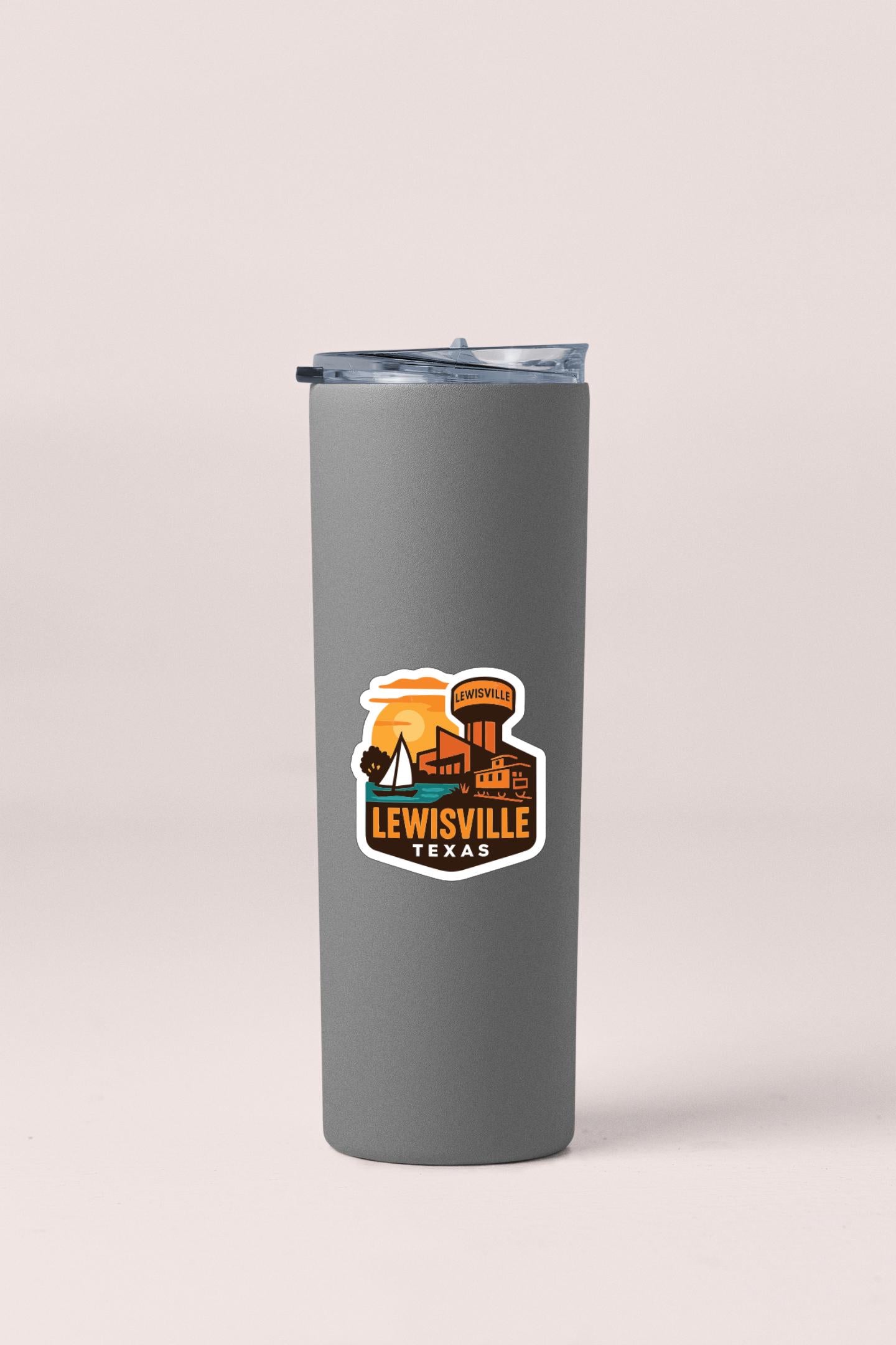 A gray insulated tumbler with a sticker depicting the city of Lewisville, Texas.