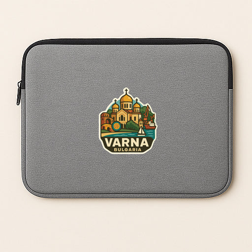a gray laptop sleeve with a sticker of a cityscape and the text "VARNA BULGARIA" printed on it.