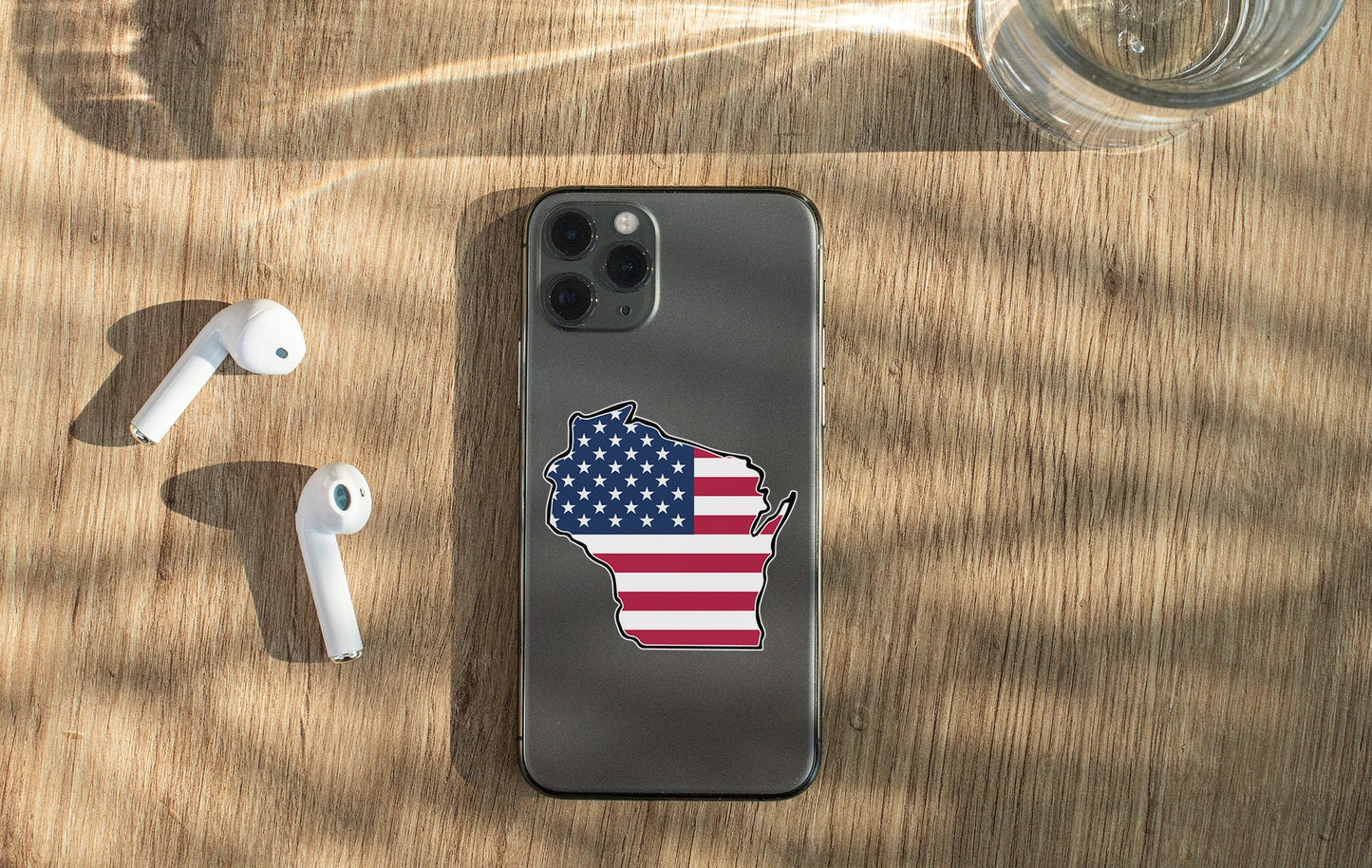 a cell phone with an american flag sticker on it
