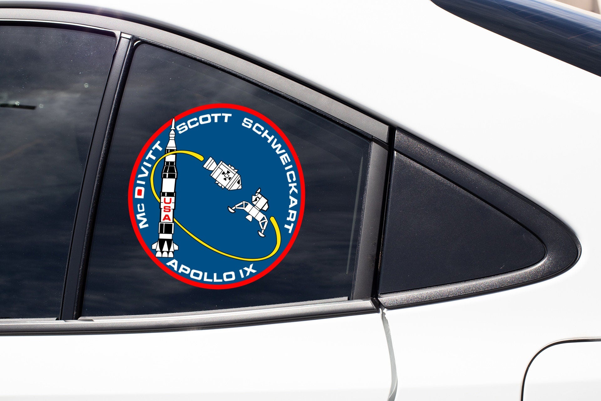 a close up of a car window with a sticker on it