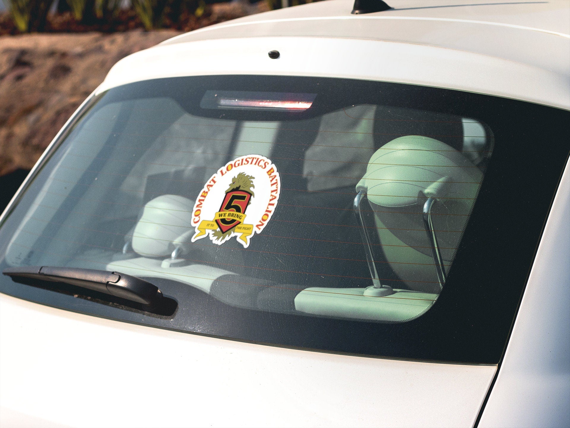 a car with a sticker on the front of it