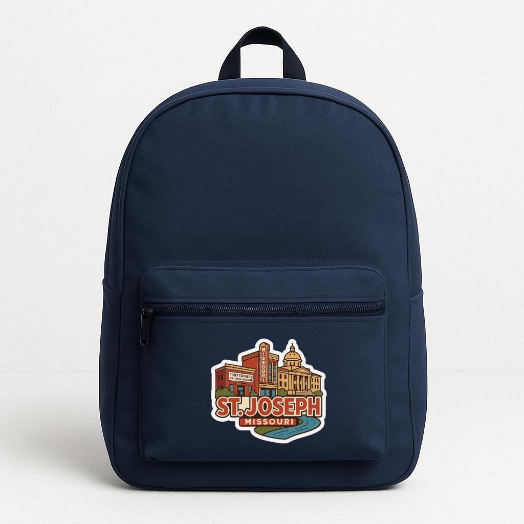 A navy blue backpack with a sticker on the front that says "St. Joseph Missouri".