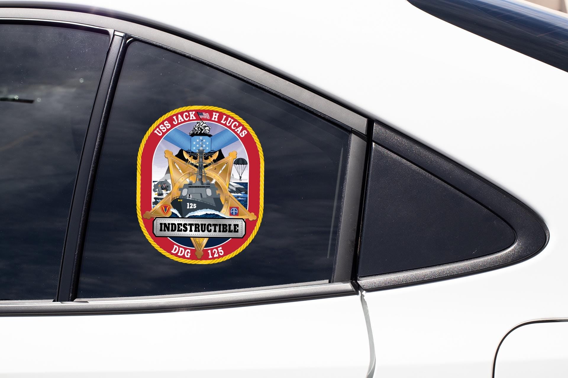 a close up of a car window with a sticker on it