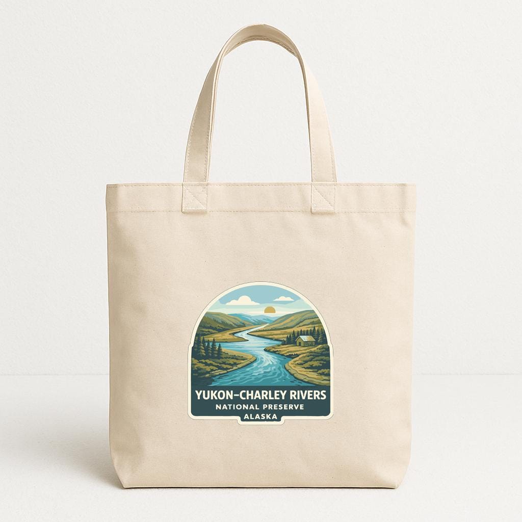 A beige tote bag with a printed label that says "Yukon-Charley Rivers National Preserve Alaska".