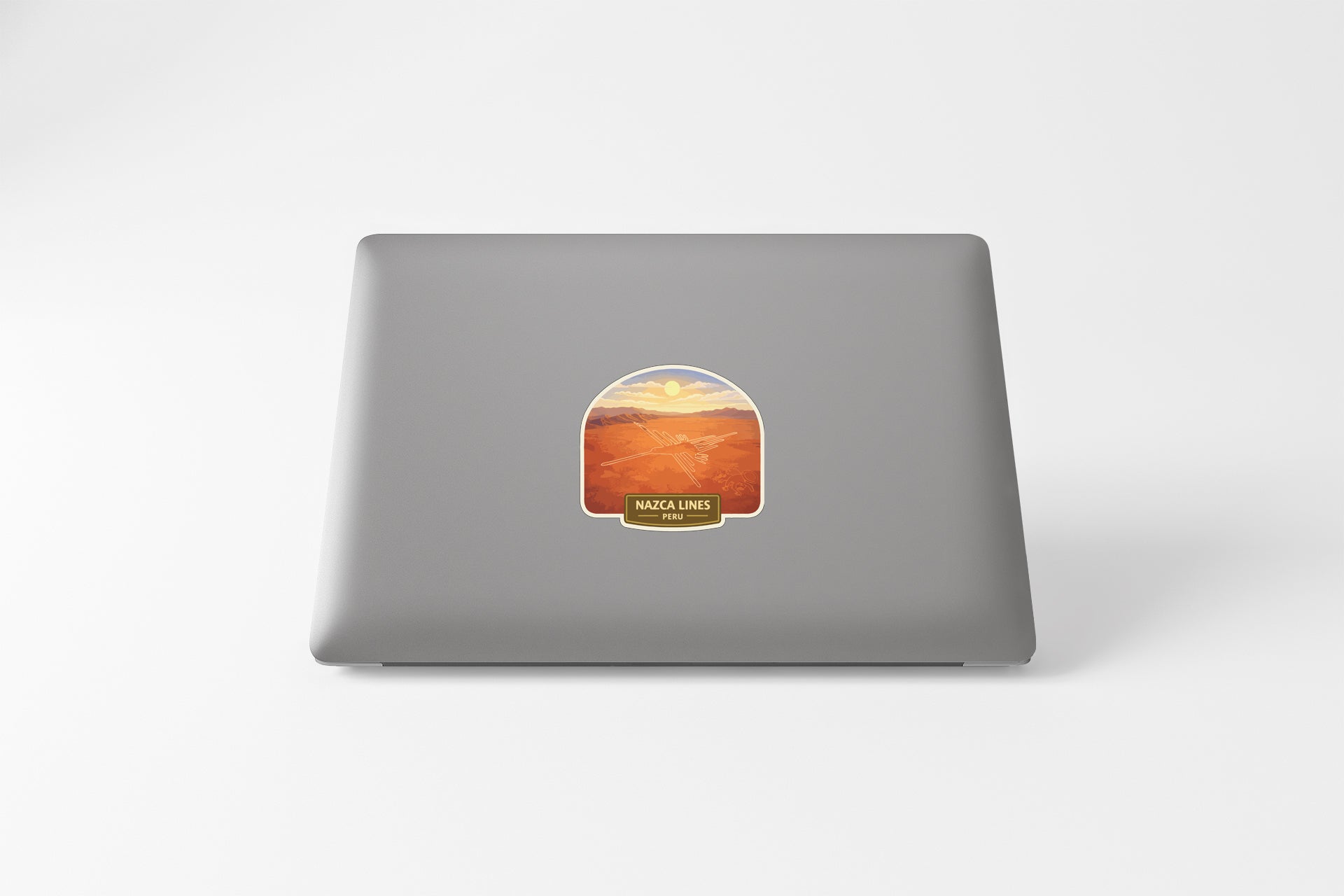 a sticker on the back of a laptop.