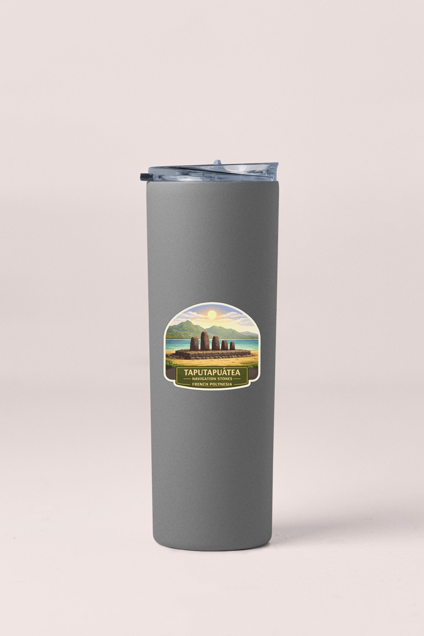 A gray insulated tumbler with a label that says "TAPUTAPUATEA" and "FRENCH POLIZEAU".