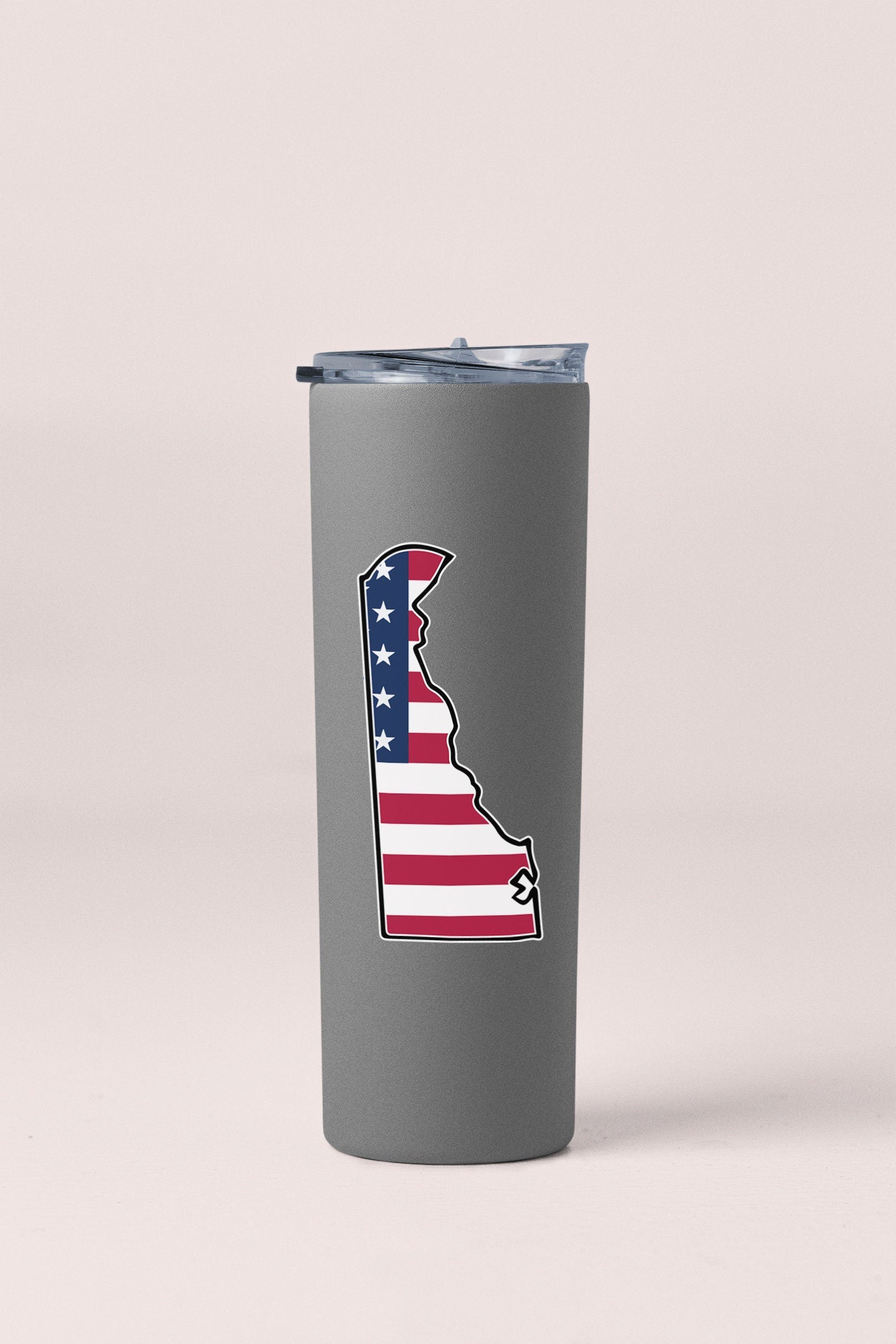 a stainless steel tumbler with the state of illinois painted on it