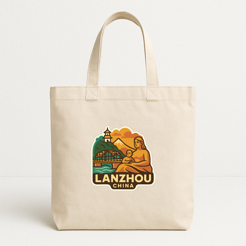 A beige tote bag with a printed design depicting a scenic landscape with mountains, a lighthouse, and a woman sitting on a bench.