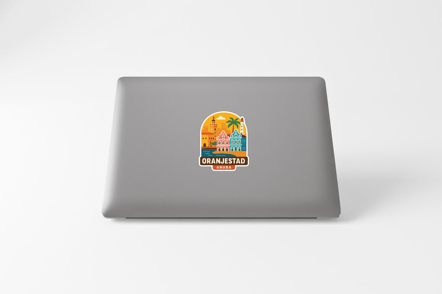 a sticker with a colorful illustration of a tropical scene, including a palm tree, buildings, and a body of water.