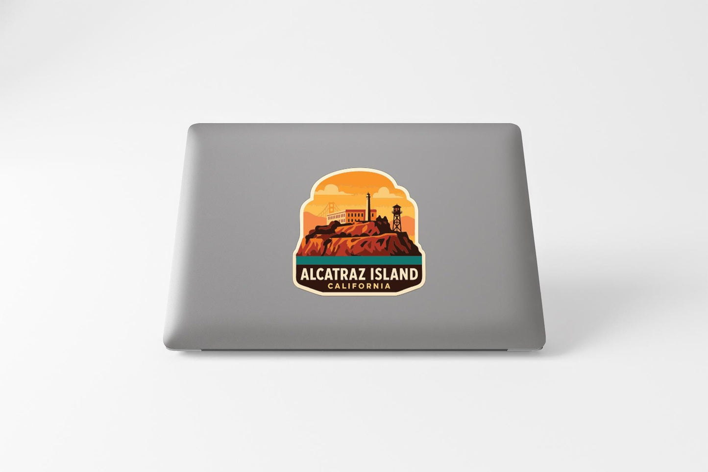 a sticker or decal of Alcatraz Island, California, with a stylized illustration of the island and its surroundings.
