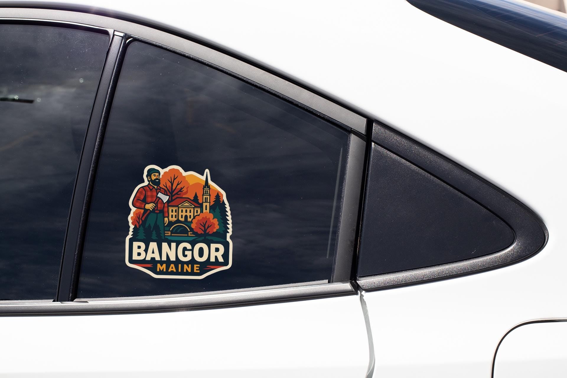 A sticker on the side of a car window that says "BANGOR Maine".