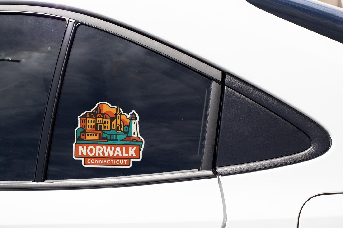 A car window with a sticker on it, featuring a colorful illustration of a cityscape with a lighthouse.