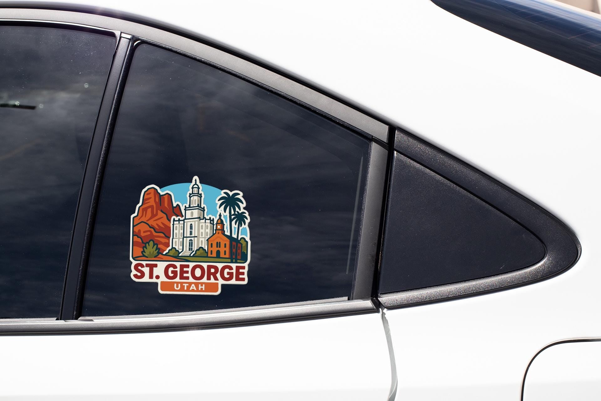 A sticker on the side of a car window, depicting the city of St. George, Utah.