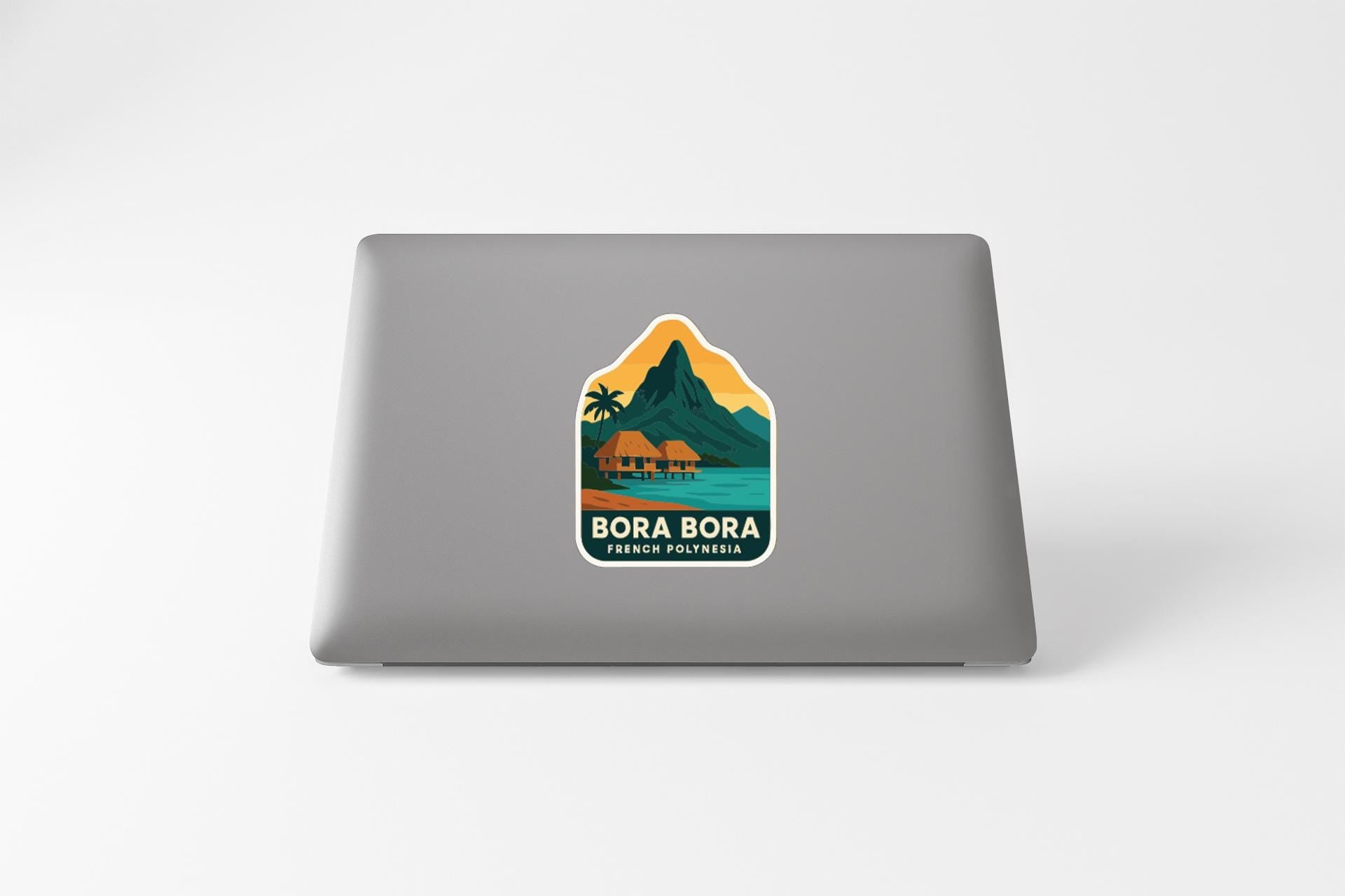 a sticker with a tropical island landscape and a mountain, with the text "BORA BORA FRENCH POLITICO".