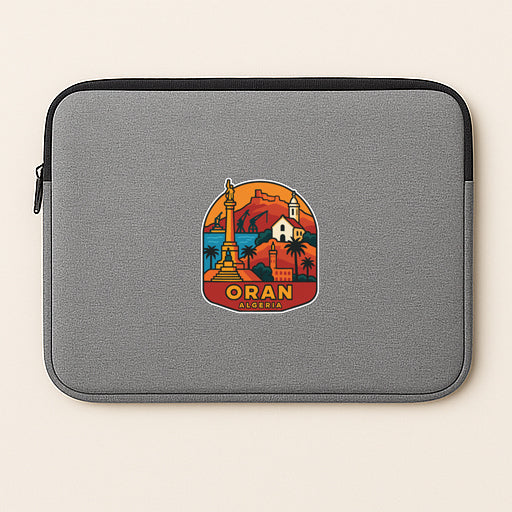 A gray laptop sleeve with a colorful sticker depicting a scenic view of Oran, a city in the Republic of the Congo.