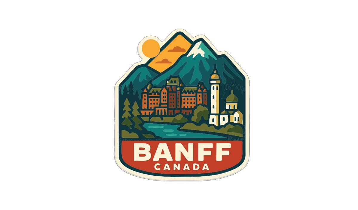 A colorful sticker or emblem featuring a mountain landscape with a castle, lighthouse, and other buildings, along with the text "BANFF CANADA".