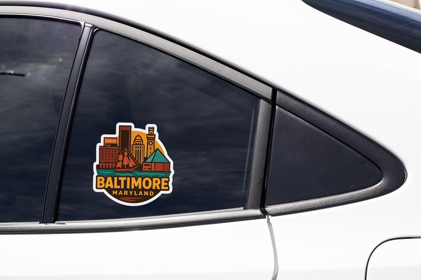 A sticker on the side of a car window that says "BALTIMORE MARYLAND".