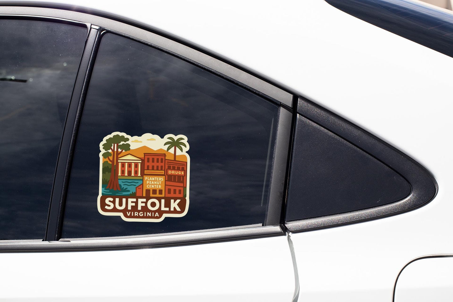 A sticker on the side of a car window, depicting a cityscape with buildings, palm trees, and a river.