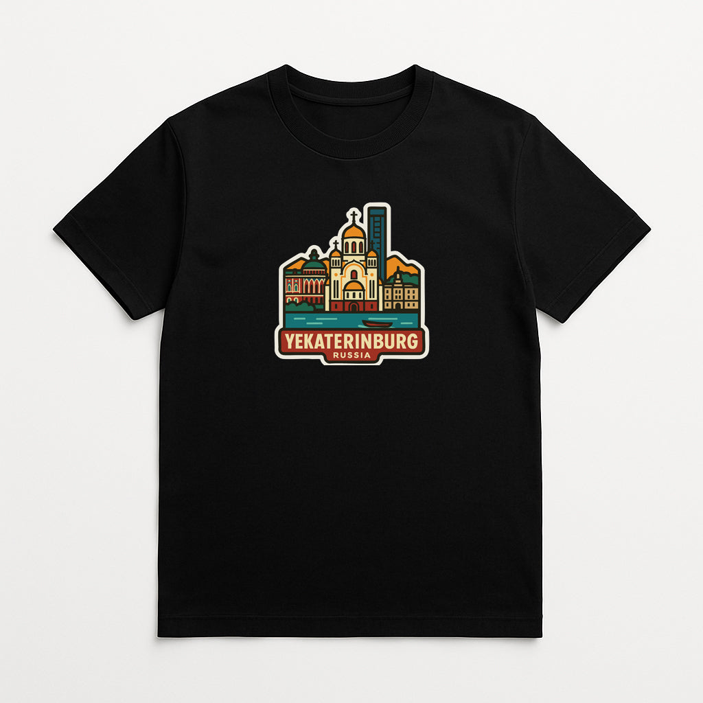 A black t-shirt with a colorful graphic design depicting a city skyline, including a church and other buildings.