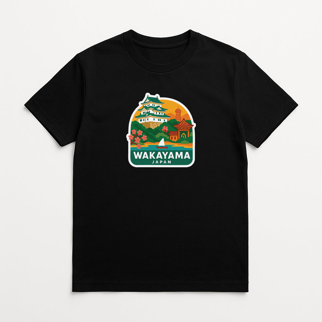 A black t-shirt with a colorful graphic design depicting various landmarks and buildings, including a temple and a pagoda, along with the text "Wakayama Japan".