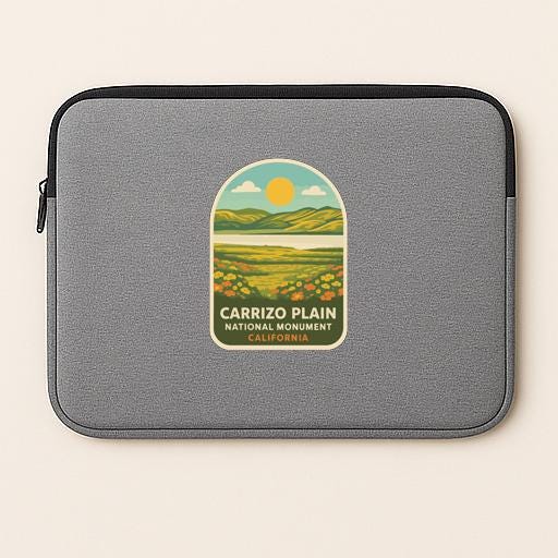 A gray laptop sleeve with a label that says "Carrillo Plain National Monument California" printed on it.