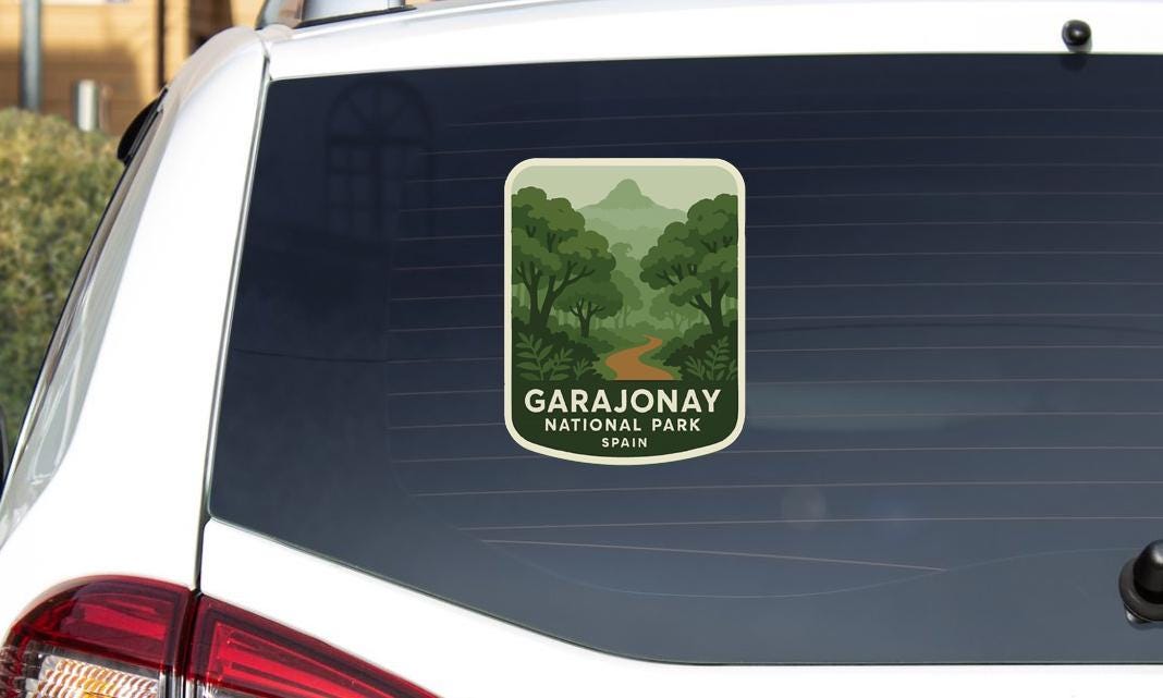 A sticker on the rear window of a car that says "GARAJONAY NATIONAL PARK SPAIN".