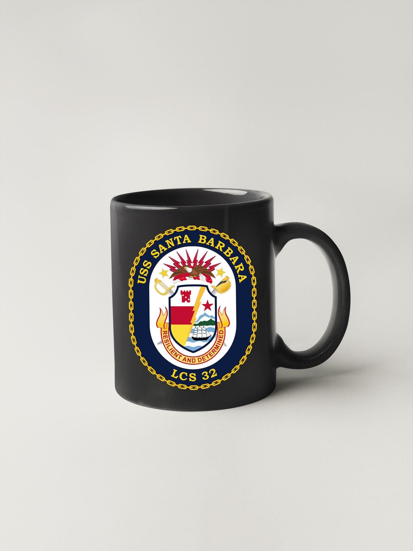 a black coffee mug with the seal of the state of kansas