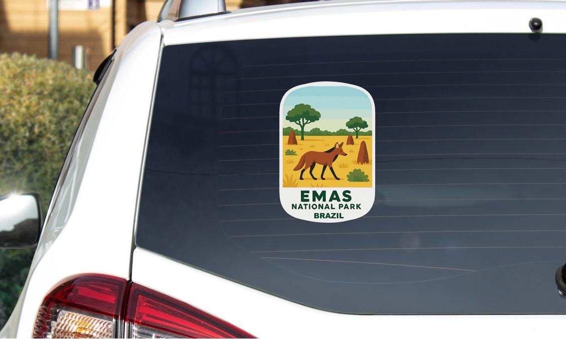 a sticker on the rear window of a car that says "Emas National Park Brazil".