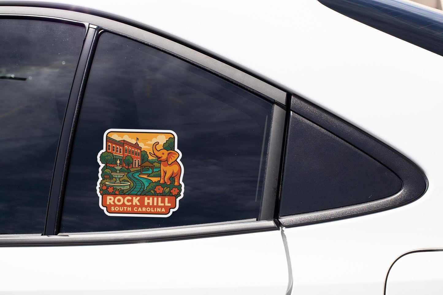 A sticker on the side of a car window, depicting a scenic view of Rock Hill, South Carolina.