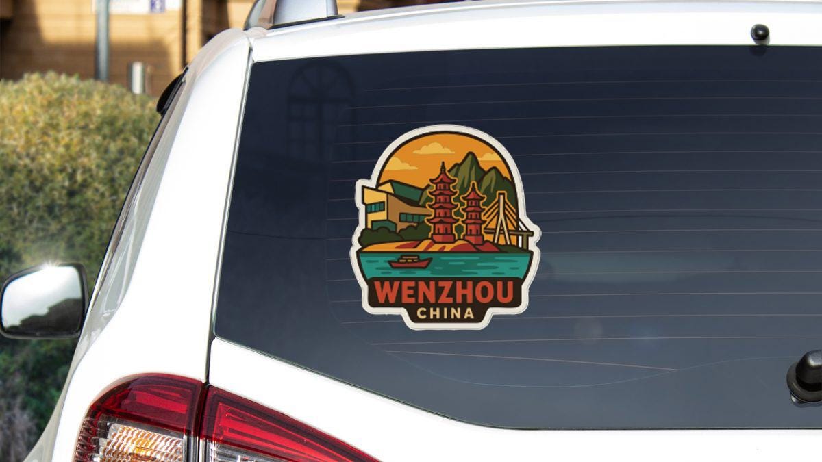 A sticker on the rear window of a car, depicting a scenic view of Wenzhou, China.