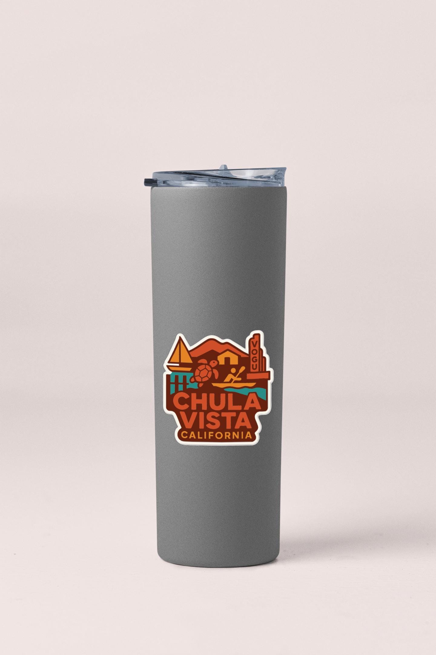 A gray insulated tumbler with a printed logo on it.