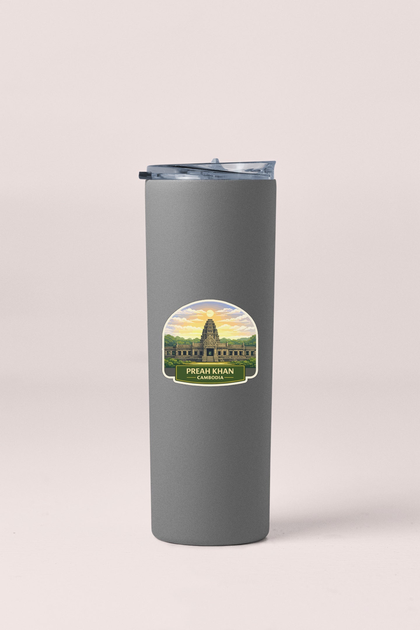 A gray tumbler with a sticker depicting the temple of Preah Khan in Cambodia.