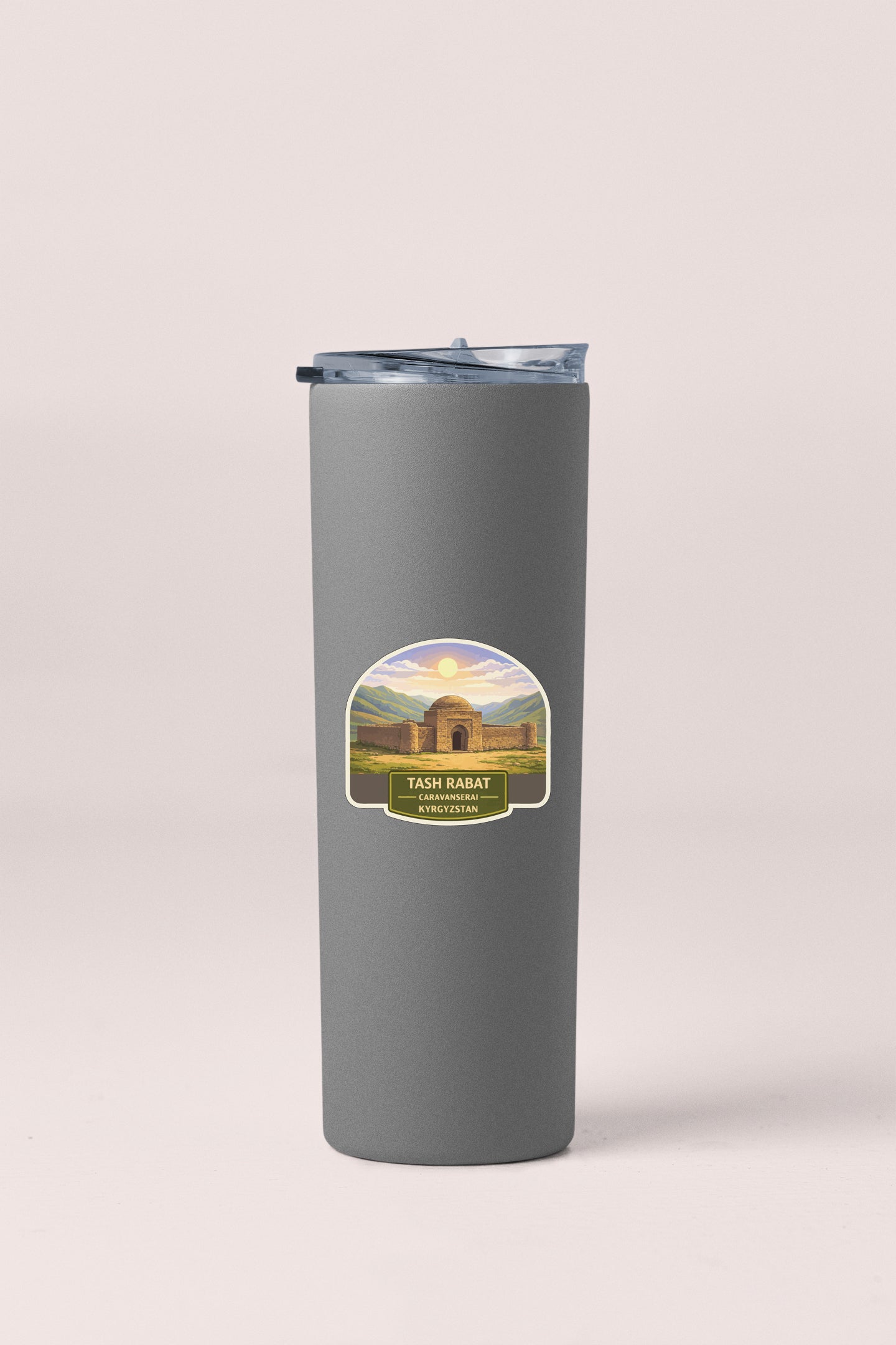 a stainless steel tumbler with a picture of a round building