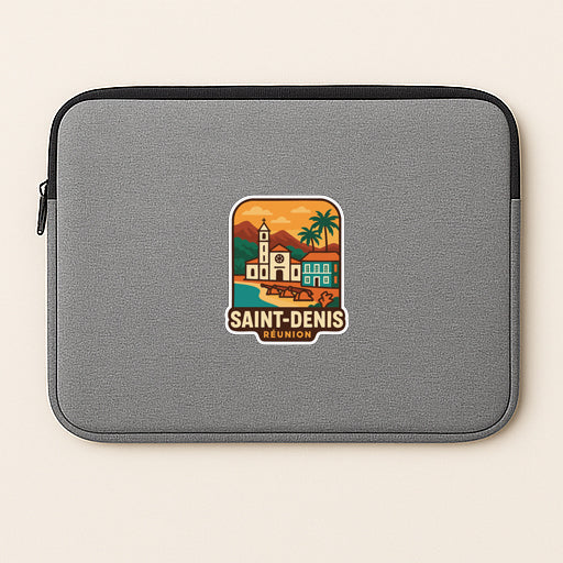 A gray laptop sleeve with a sticker depicting a tropical island and a church.