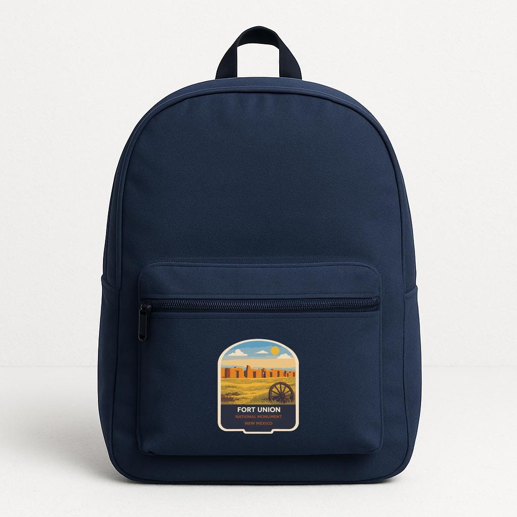 A navy blue backpack with a graphic patch on the front that says "Fort Union, New Mexico".